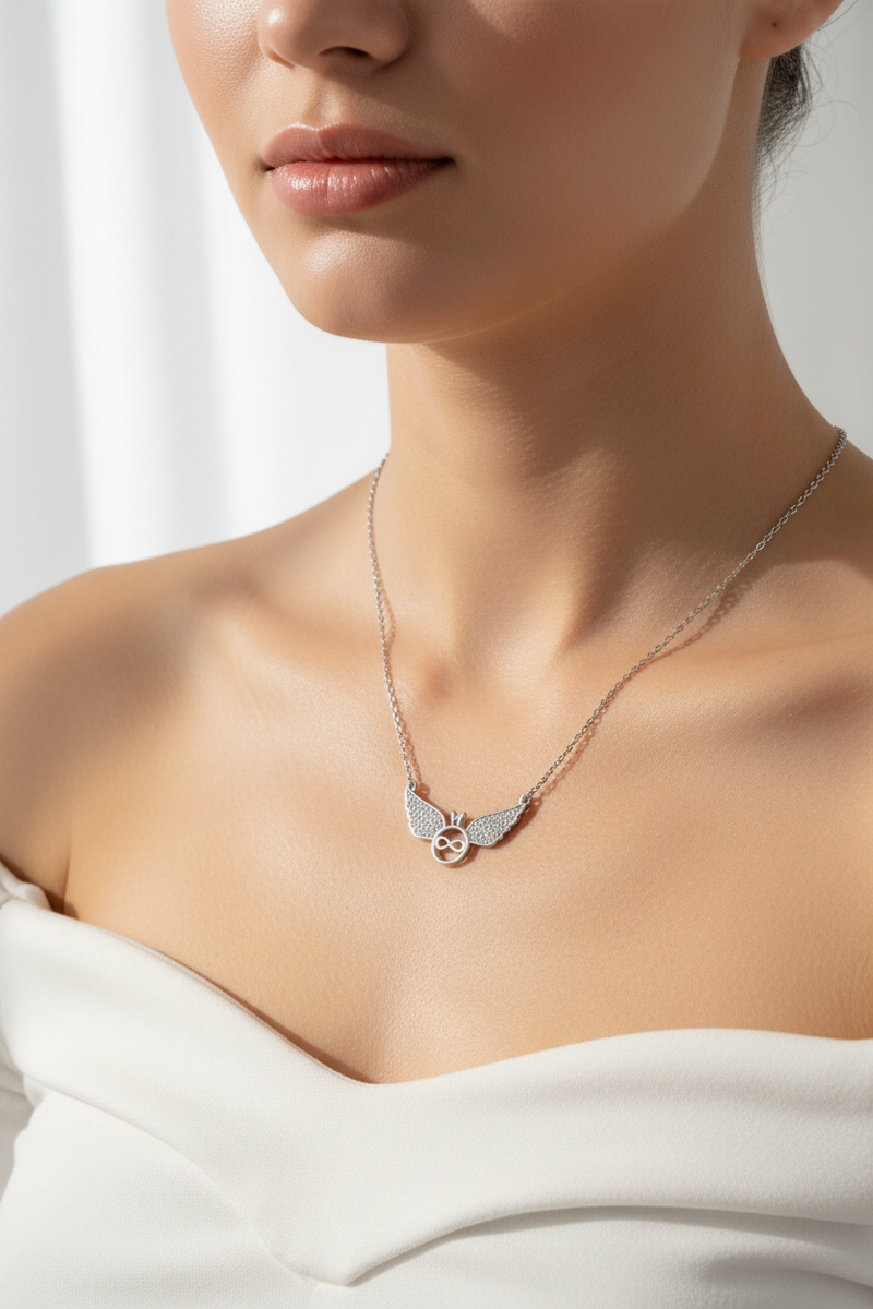 925 Sterling Silver Angel Wings Infinity Necklace bright airy studio white off-shoulder modeling shoot